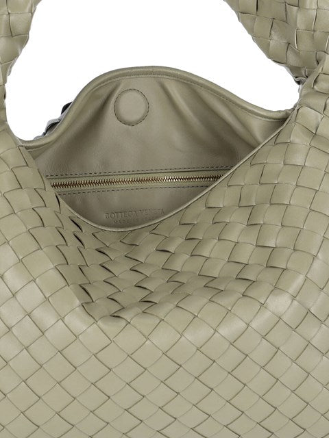 Close-up of Bottega Veneta shoulder bags hardware and fine stitching