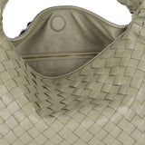 Close-up of Bottega Veneta shoulder bags hardware and fine stitching