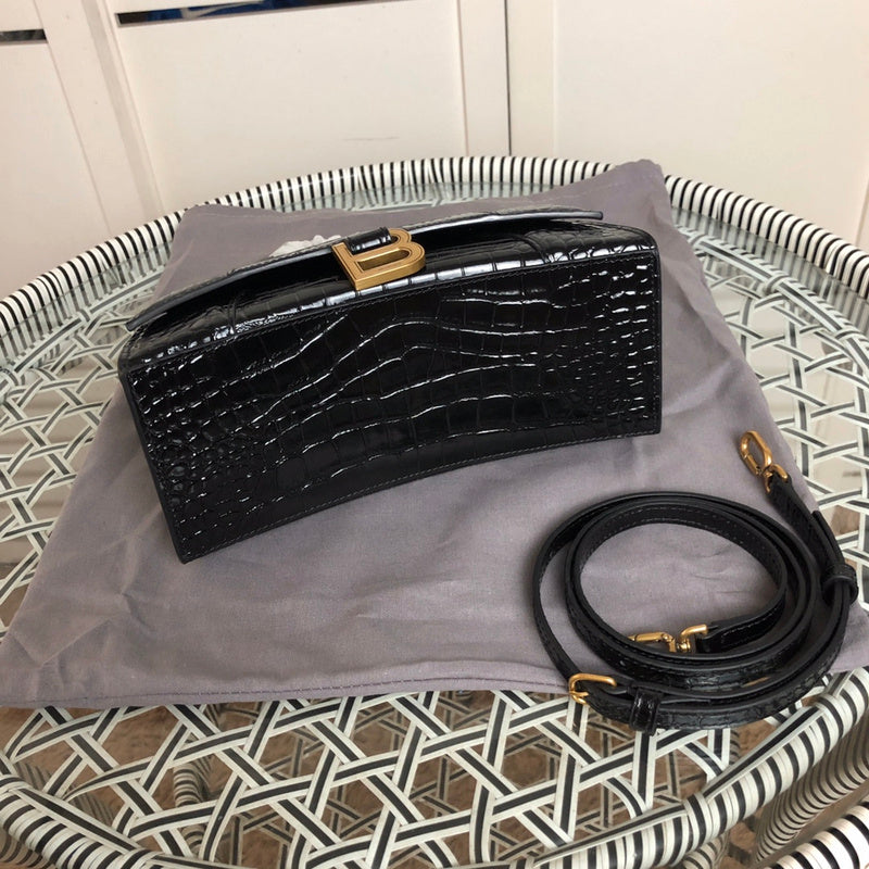 Back view of classic sleek women's handbag – women's luxury accessory