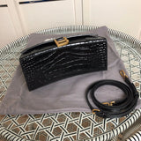 Back view of classic sleek women's handbag – women's luxury accessory