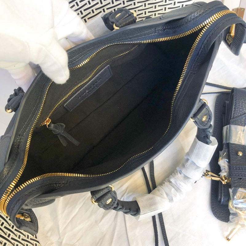 Side profile of polished elevated women's handbag – women's luxury accessory