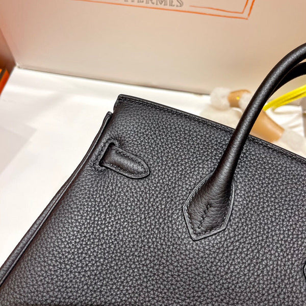 Side view of balanced structured handbag