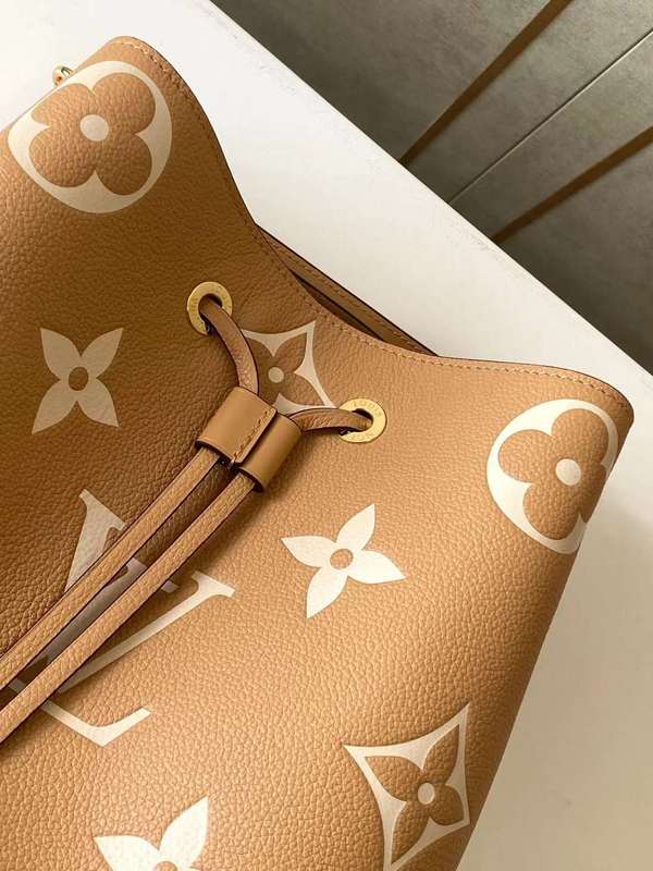 Handle and strap detail of modern structured women's handbag – women's luxury accessory