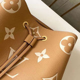 Handle and strap detail of modern structured women's handbag – women's luxury accessory