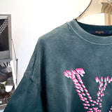 Front view of Louis Vuitton luxury clothing with everyday silhouette
