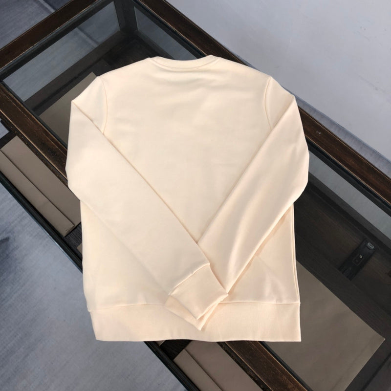 Close-up detail shot of Gucci luxury clothing with relaxed-fit cut