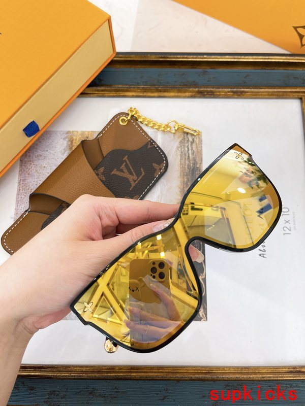 Close-up detail view of Louis Vuitton unisex sunglasses