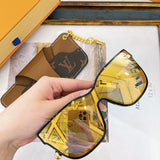 Close-up detail view of Louis Vuitton unisex sunglasses