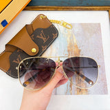 Front view of Louis Vuitton unisex sunglasses
