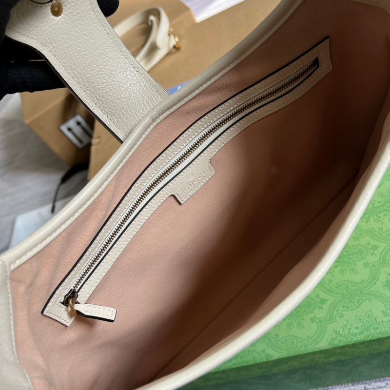 Side view of classic structured handbag