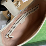 Side view of classic structured handbag