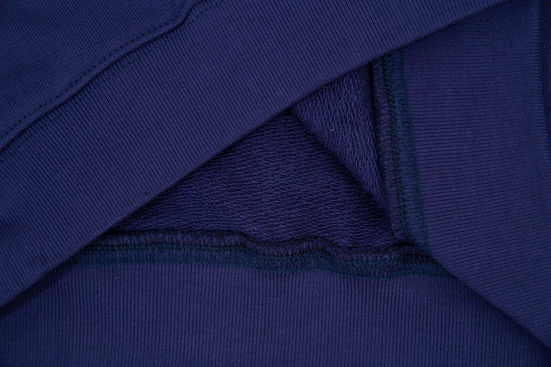 Side profile of Gucci luxury clothing with everyday silhouette