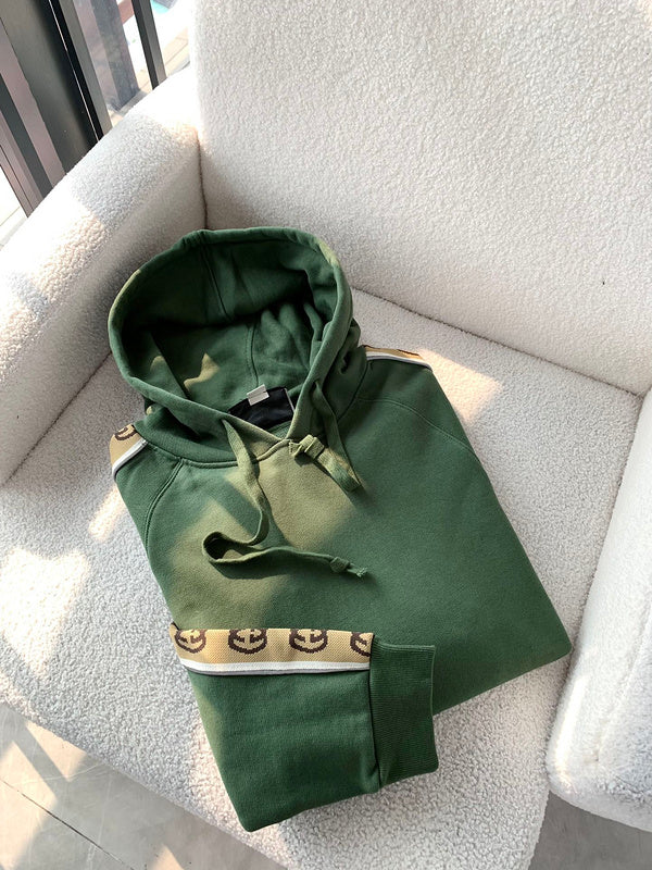 Side profile of Gucci luxury clothing with logo-detail design