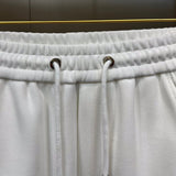 Close-up detail shot of Louis Vuitton luxury clothing with runway-inspired design