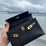 Side view of classic structured handbag