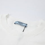 Close-up detail shot of Polo cotton polo shirt with signature branding