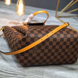 Handle and strap detail of chic elevated women's handbag – women's statement bag