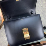 Handle and strap detail of elevated classic women's handbag – women's statement bag