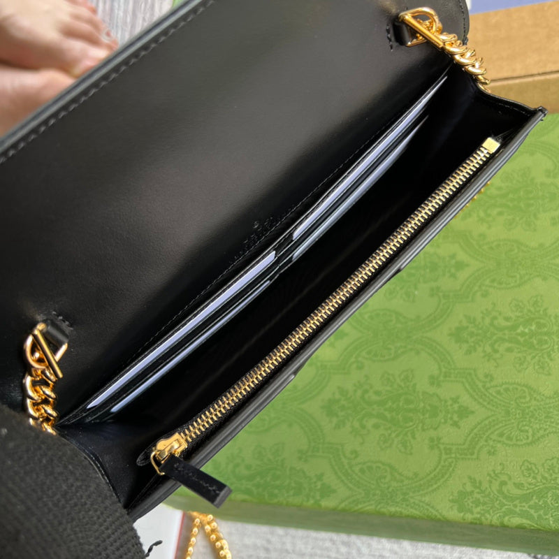 Side view of fluid structured handbag