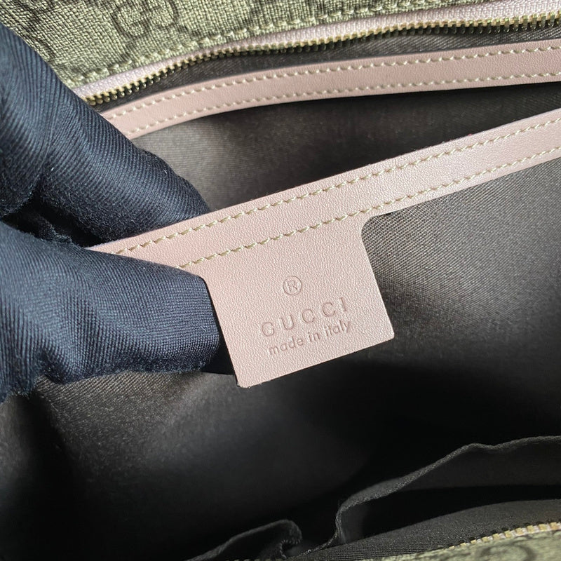 Side profile of everyday-luxe structured women's handbag – women's statement bag