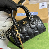 Handle and strap detail of structured polished women's handbag – women's luxury accessory