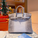 Side view of clean-lined structured handbag