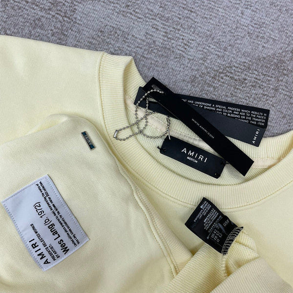 Three-quarter angle view of Amiri luxury piece style No.112