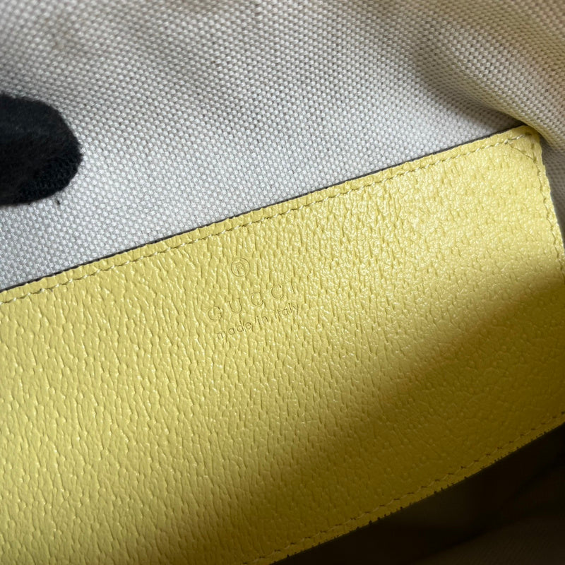 Side view of classic structured handbag