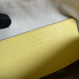 Side view of classic structured handbag