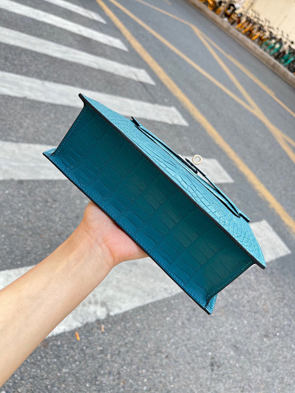 Side view of minimalist structured handbag