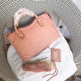Top view of chic structured women's handbag – women's everyday handbag