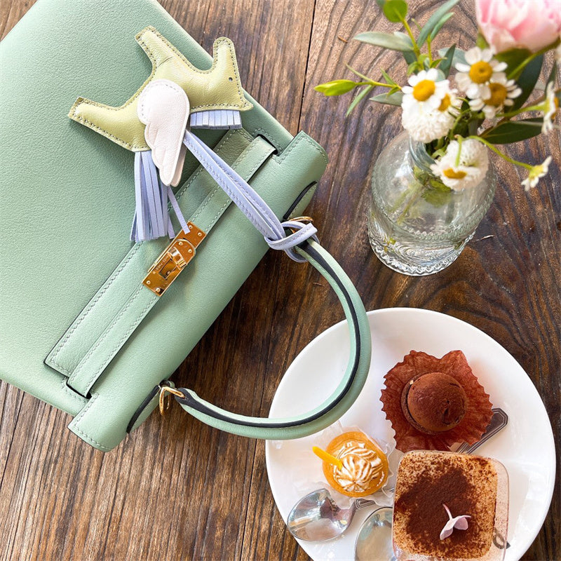 Side view of streamlined structured handbag