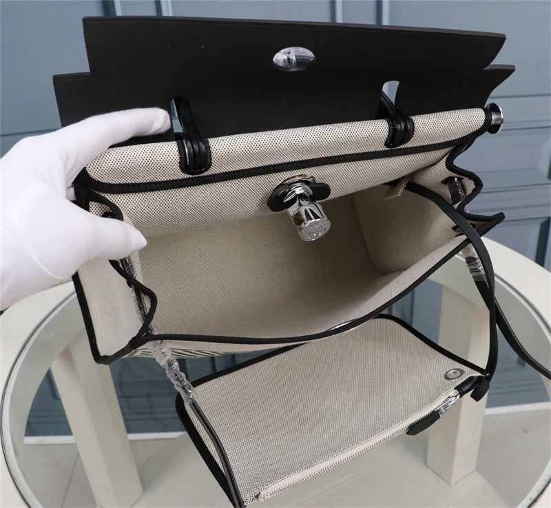 Side view of minimalist structured handbag
