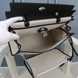Side view of minimalist structured handbag