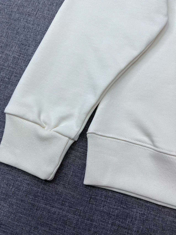 Close-up detail shot of Gucci luxury clothing with signature branding