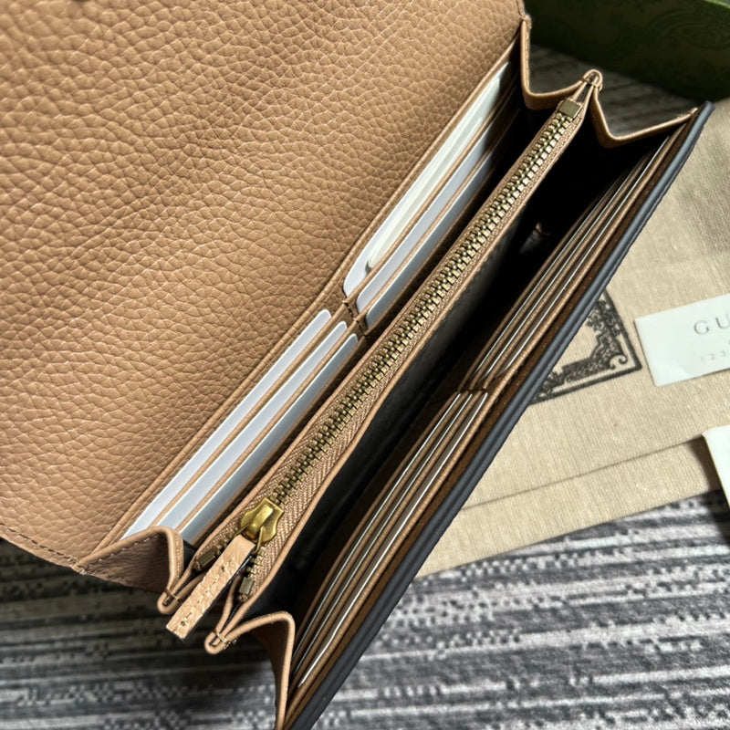 Side profile of polished signature women's handbag – women's designer-style accessory