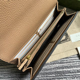 Side profile of polished signature women's handbag – women's designer-style accessory