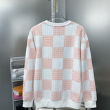 Side profile of Louis Vuitton luxury clothing with label-forward styling