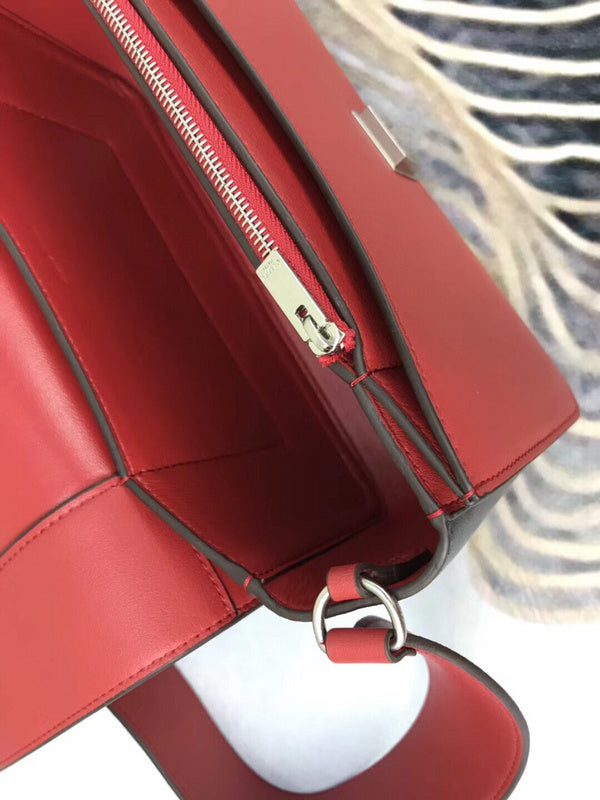 Front view of statement modern women's handbag – women's statement bag