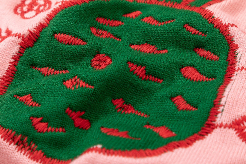Flat lay presentation of Gucci luxury clothing with logo-detail design