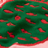 Flat lay presentation of Gucci luxury clothing with logo-detail design