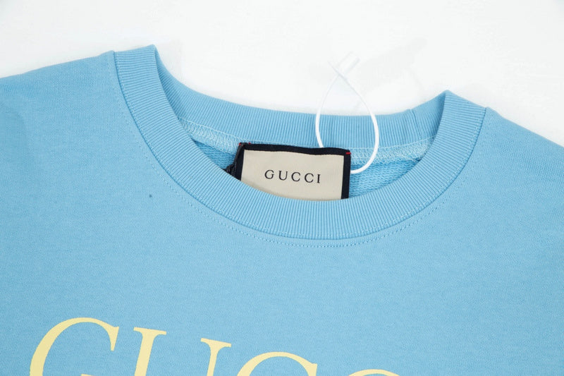 Close-up detail shot of Gucci luxury clothing with contemporary cut
