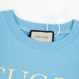 Close-up detail shot of Gucci luxury clothing with contemporary cut