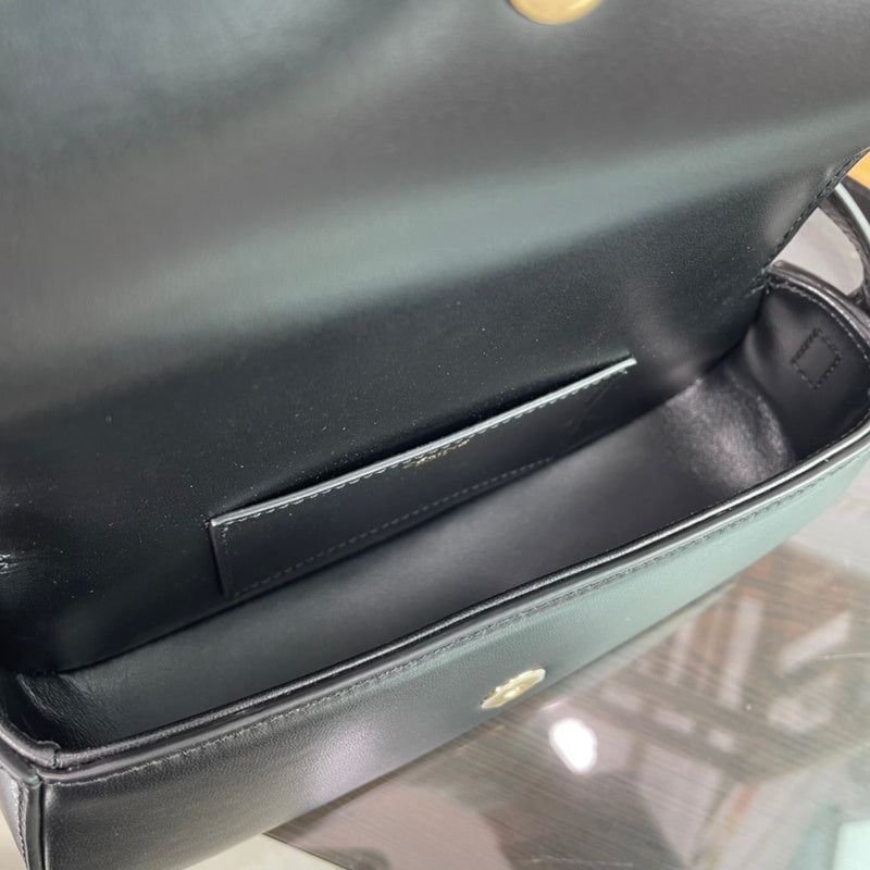 Side profile of classic refined women's handbag – women's luxury handbag