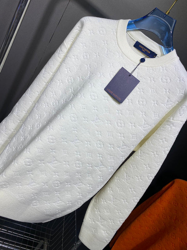 Close-up detail shot of Louis Vuitton luxury clothing with runway-inspired design