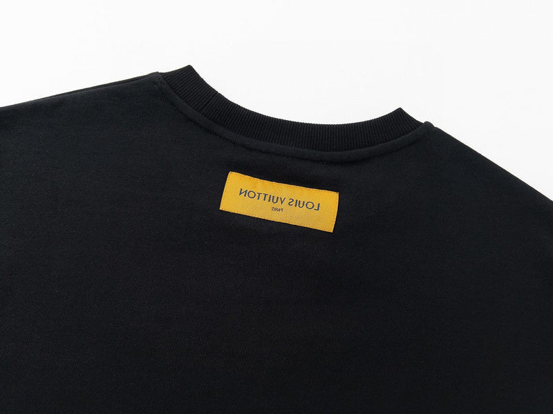 Front view of Louis Vuitton luxury clothing with signature branding
