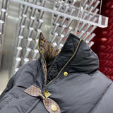 Close-up detail shot of Louis Vuitton luxury clothing with everyday silhouette