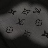 Flat lay presentation of Louis Vuitton luxury clothing with monogram-inspired silhouette