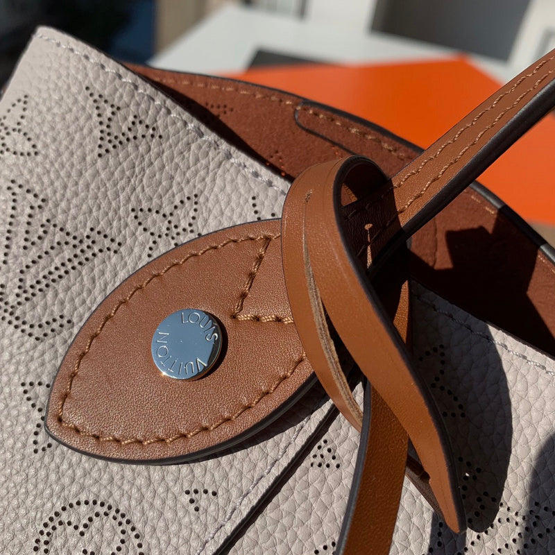 Front view of elevated everyday-luxe women's handbag – women's luxury accessory