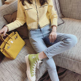 signature handbag styled with outfit